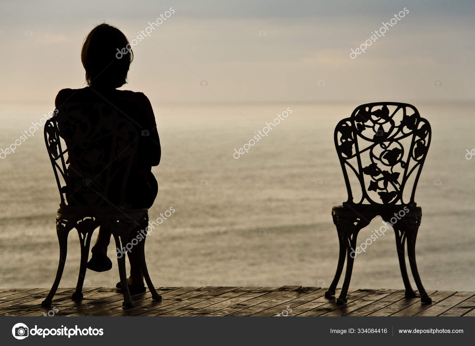 Lonely Girl Chair — Stock Photo © PantherMediaSeller #334084416