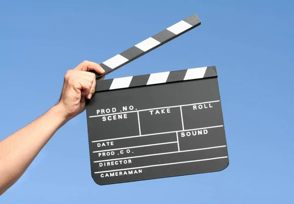 Hand Holding Clapper Board Isolated Blue Background — Stock Photo, Image