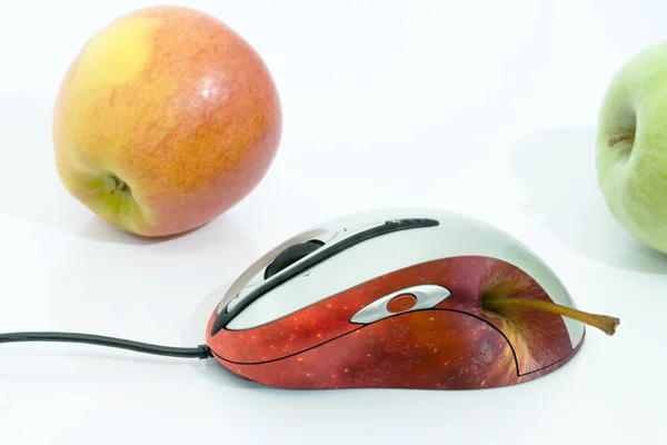 apple and a mouse on a white background