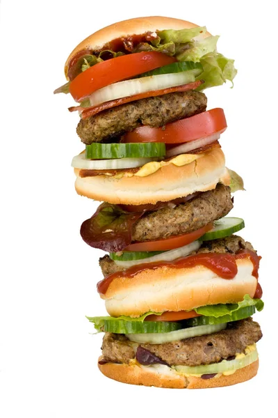 白い背景に隔離された4倍のハンバーガー — ストック写真