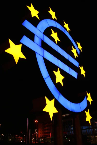 euro sign in front of euro tower.