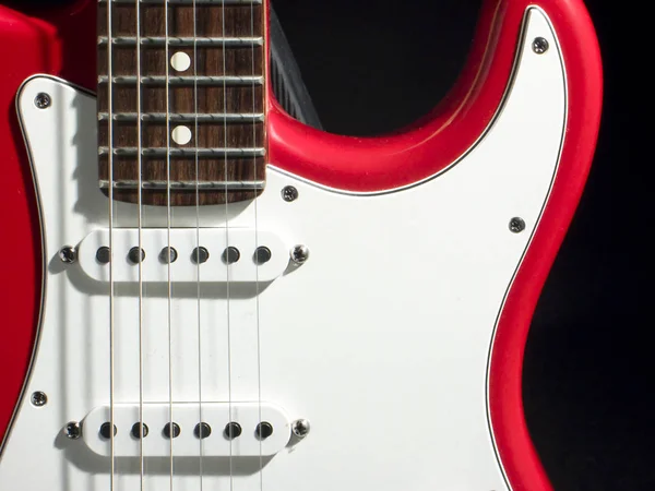 Red Electric Guitar Table Stock Image