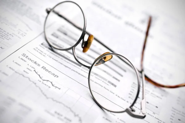 Glasses Newspaper Stock Report Royalty Free Stock Images