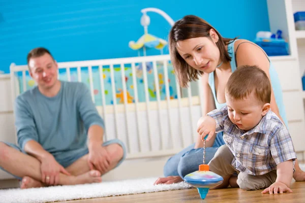 Happy family playing at home