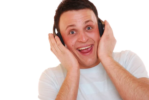 Porträt Eines Jungen Mannes Der Über Kopfhörer Musik Hört — Stockfoto