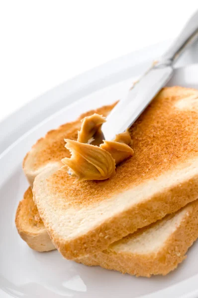 Espalhando Manteiga Amendoim Torradas — Fotografia de Stock