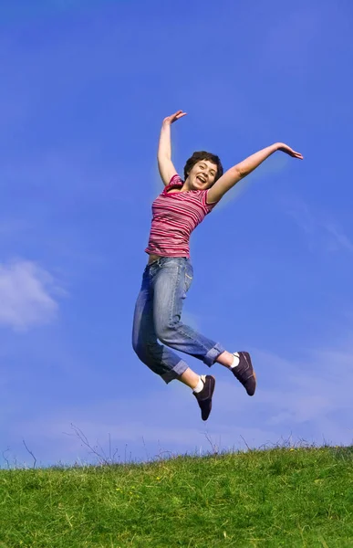 Joven Mujer Feliz Saltando Contra — Foto de Stock