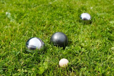 golf ball on green grass clipart