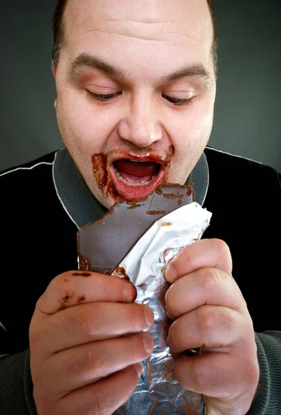 Angry Man Eating Sandwich — Stock Photo, Image