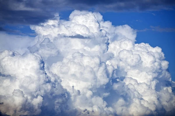 thunder cloud and blue sky