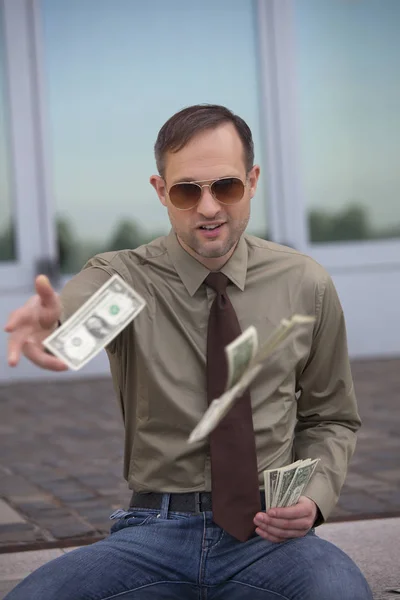 Man Throwing Money — Stock Photo, Image