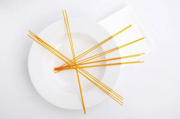 Abstract Uncooked Red Tomato Pasta White Plate — Stock Photo, Image