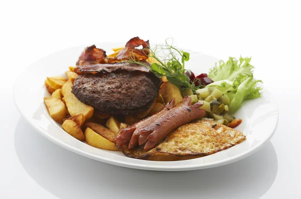 Deep Fried Potatoes Sausages Beef Bacon Vegetables Dinner Plate — Stock Photo, Image