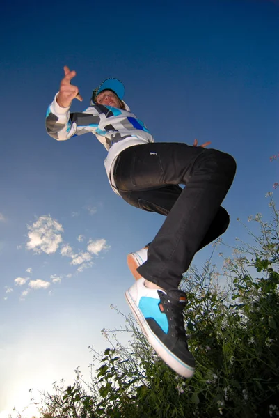 Man Jumping Roof Blue Sky — Stock Photo, Image