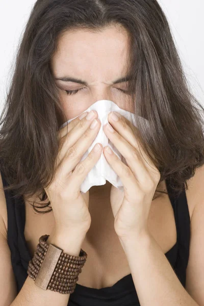 Woman Sneezes Scarf Stock Picture