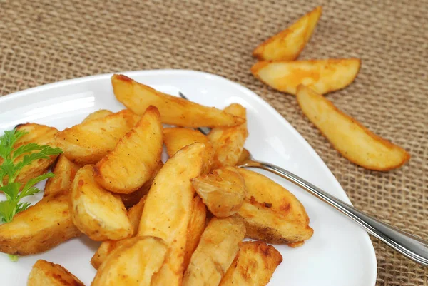 Kartoffelkeile Auf Einem Teller — Stockfoto