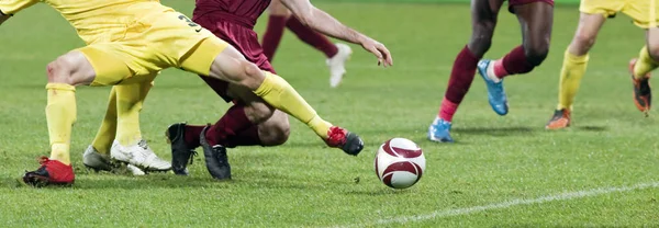 Soccer Player Kicking Ball Stock Picture