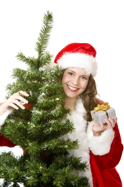 Young Smiling Santa Woman Fir Tree Holds Christmas Gift — Stock Photo, Image