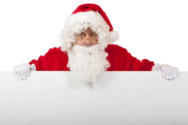 Zaskoczony Święty Mikołaj Trzyma Tablicę Ogłoszeń Świątecznych — Zdjęcie stockowe