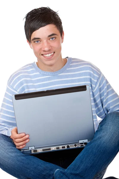 年轻快乐的男生坐在地板上 带着笔记本电脑和书本 — 图库照片