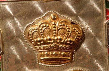 golden crown on the bronze background clipart