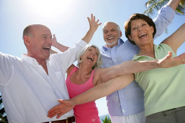 Happy Group Seniors Raising Arm — Stock Photo, Image