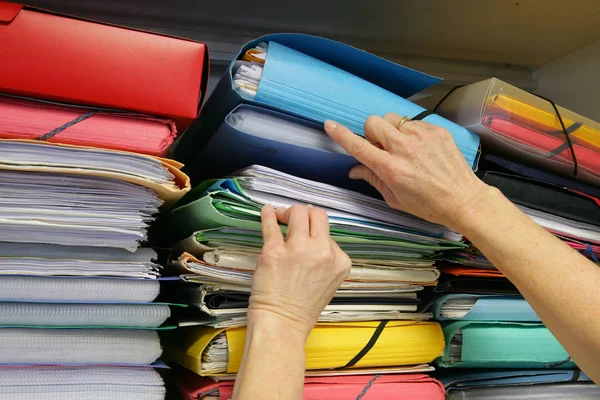 stack of colorful folders in the store