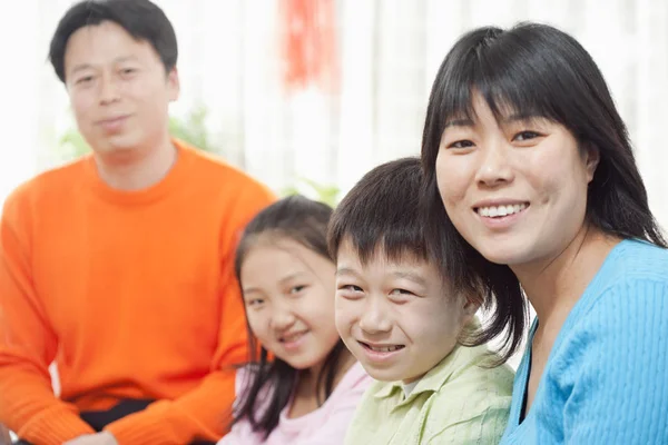 Family Smiling Camera Horizontally Framed Shot — Stock Photo, Image