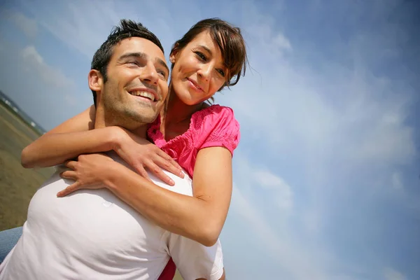 Portrait Man Smiling Woman His Back Sea Stock Picture