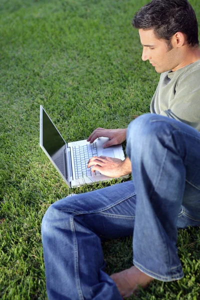 Man Laptop Lying Grass Profile — Stock Photo, Image