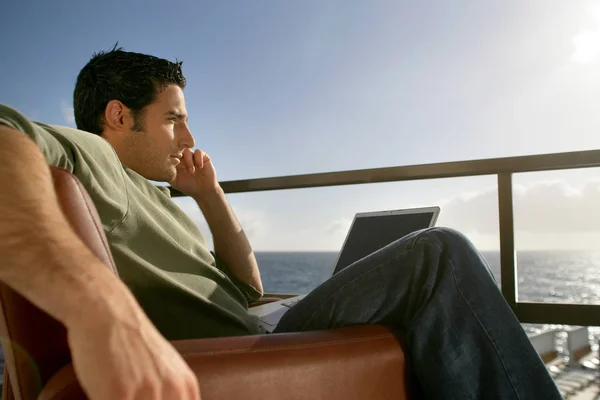 Man Sitting Armchair Terrace Computer Mobile Phone Fro — Stock Photo, Image