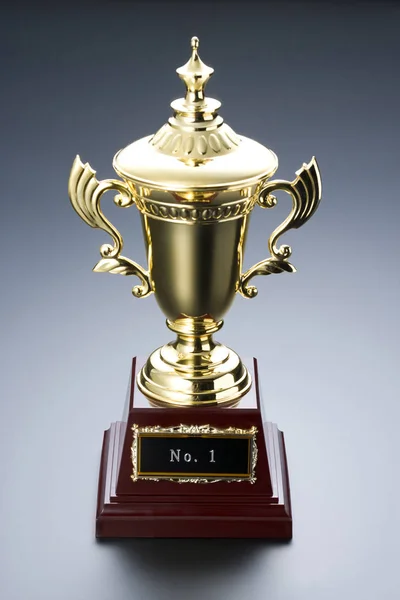 Taça Troféu Dourado Com Estrela Ouro Fundo Azul — Fotografia de Stock