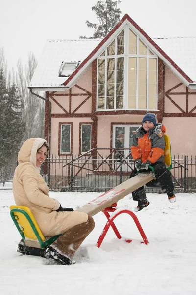 Mother Son Winter Seesaw — Stock Photo, Image