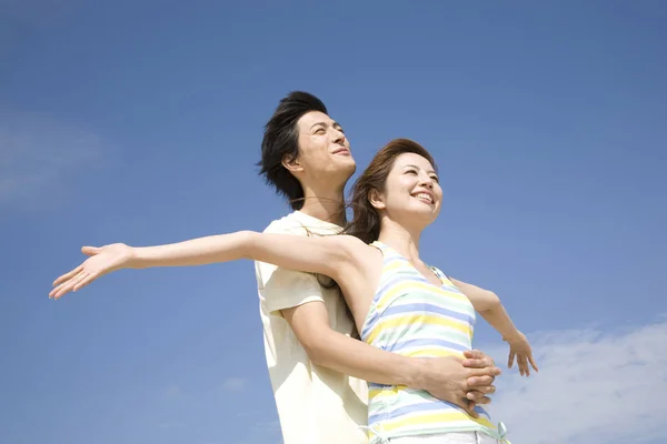 Japanese Man Embracing His Lover Back — Stock Photo, Image