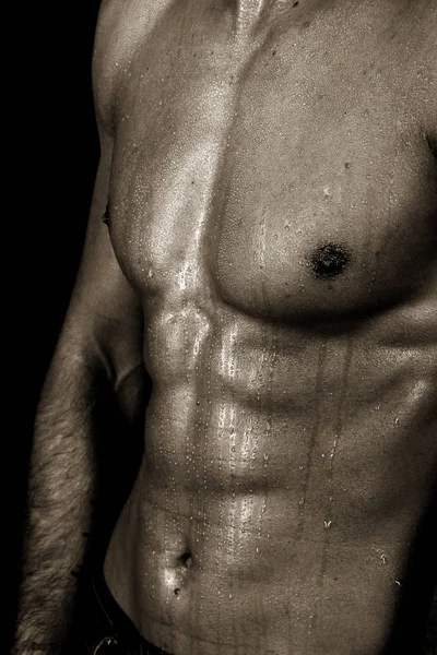 Hombre Musculoso Con Torso Desnudo Sobre Fondo Negro — Foto de Stock