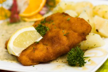 Deep fried fresh Cod Fish with Potato and Sauce clipart