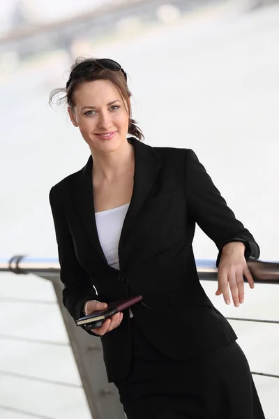 business woman in suit with tablet pc