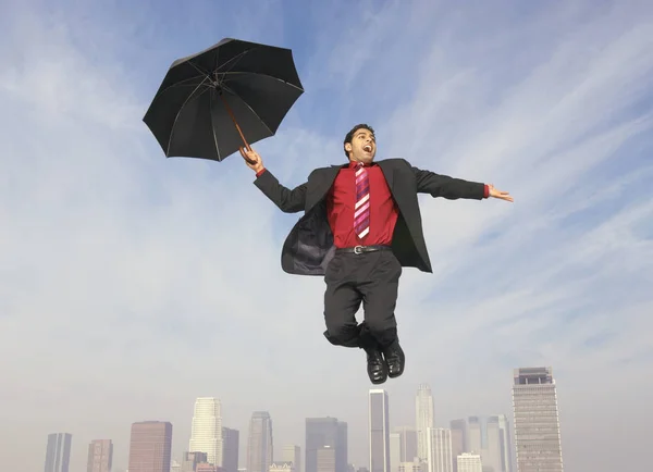 Padající Podnikatel Deštníkem — Stock fotografie