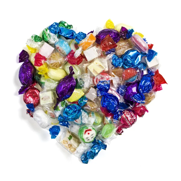 ハート型の白に包まれたキャンディ — ストック写真