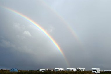 rainbow over the campsite clipart