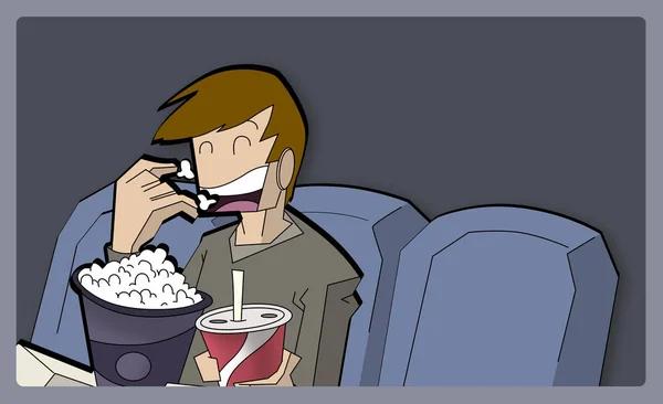 Boy eating popcorns in a movie theater