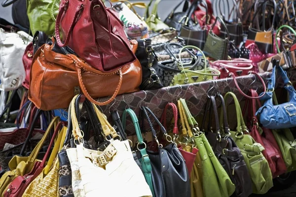 Close-up of hand bags and purses at a store