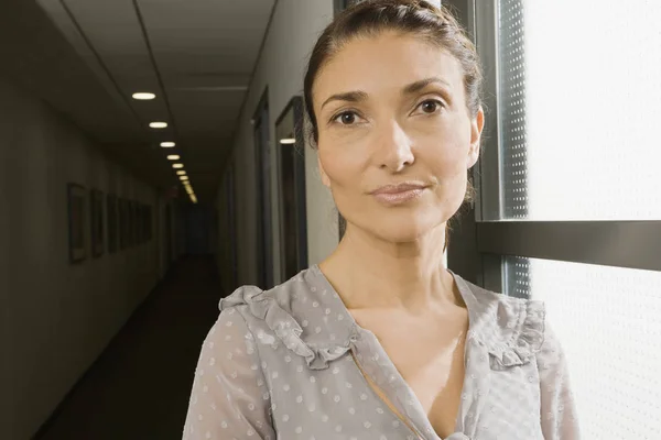 Portrait of a businesswoman smirking