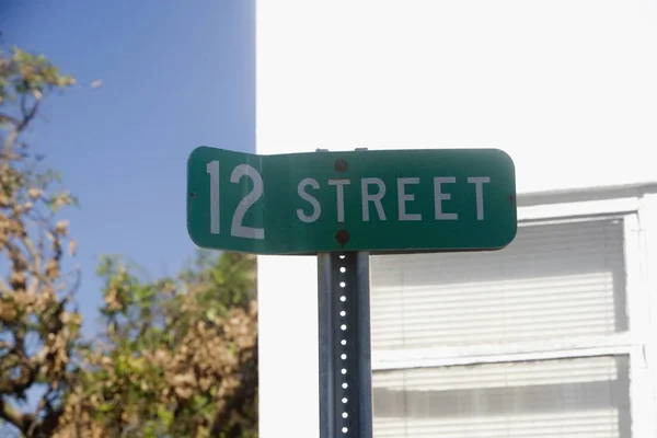 Close-up of a street name sign