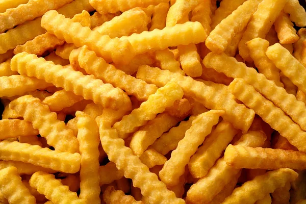 Close Sfondo Grinza Taglio Croccante Patatine Fritte Oro Patatine Fritte — Foto Stock