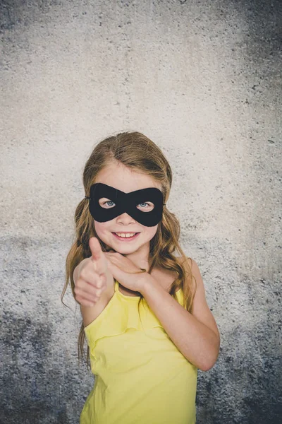 Beautiful Blond Girl Black Superhero Mask Yellow Shirt Posing Front — ストック写真