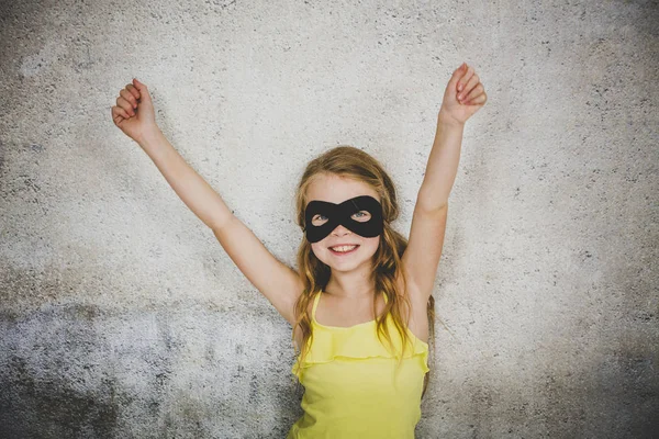 Beautiful Blond Girl Black Superhero Mask Yellow Shirt Posing Front — ストック写真