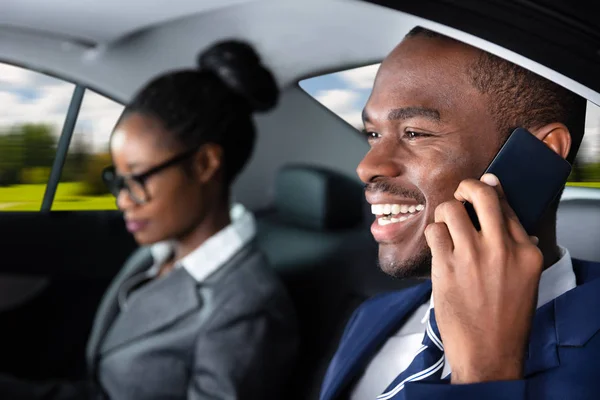 Happy Businessman Sitting Car His Female Colleague Talking Cellphone — Stock Photo, Image