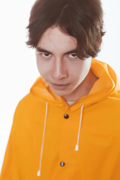 Portrait Teen Guy Yellow Raincoat Brunette Studio — Stock Photo, Image