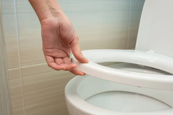 Hand Raise Toilet Seat — Stock Photo, Image